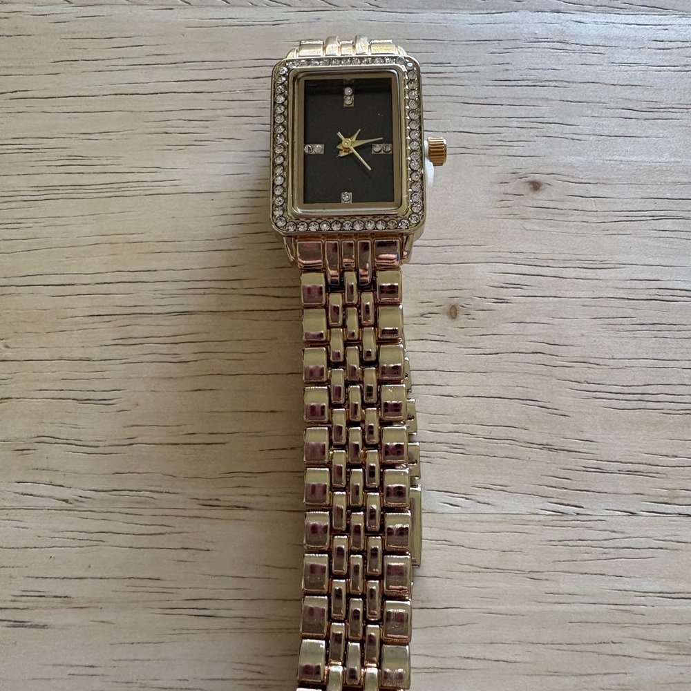 Elegant Gold and Black Women's Watch